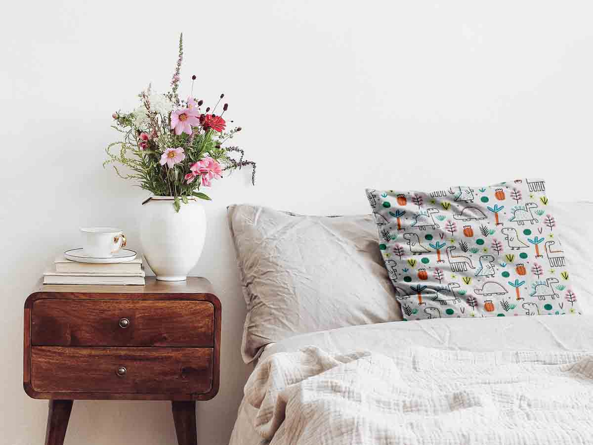 Gesundheitskissen mit bunten Dinos